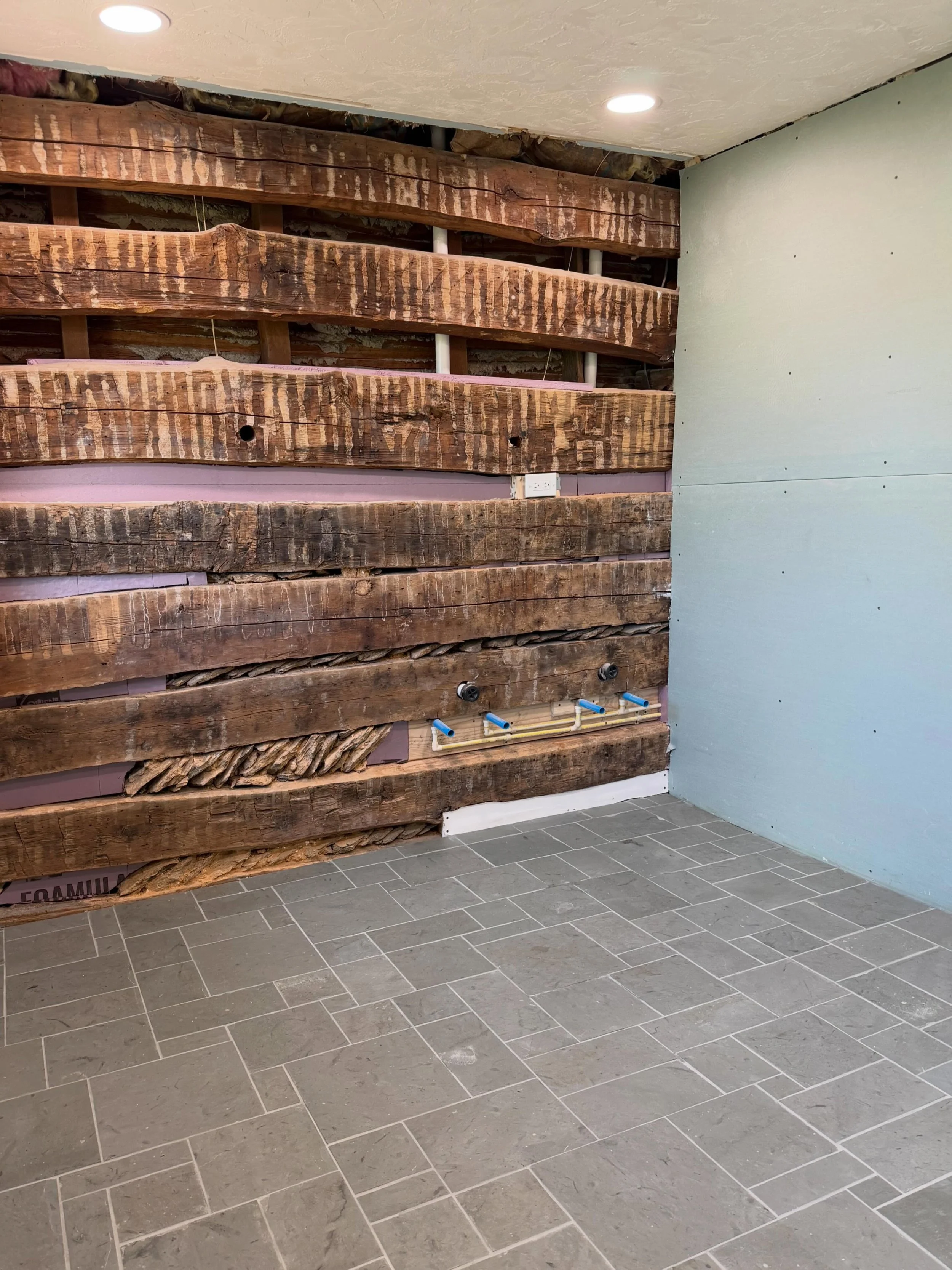 This was a special project! 

The homeowner was able to get ahold of the old natural slate flooring from her parent&rsquo;s home she grew up in, when it was recently removed during renovations. 

We were able to closely replicate the layout by refere