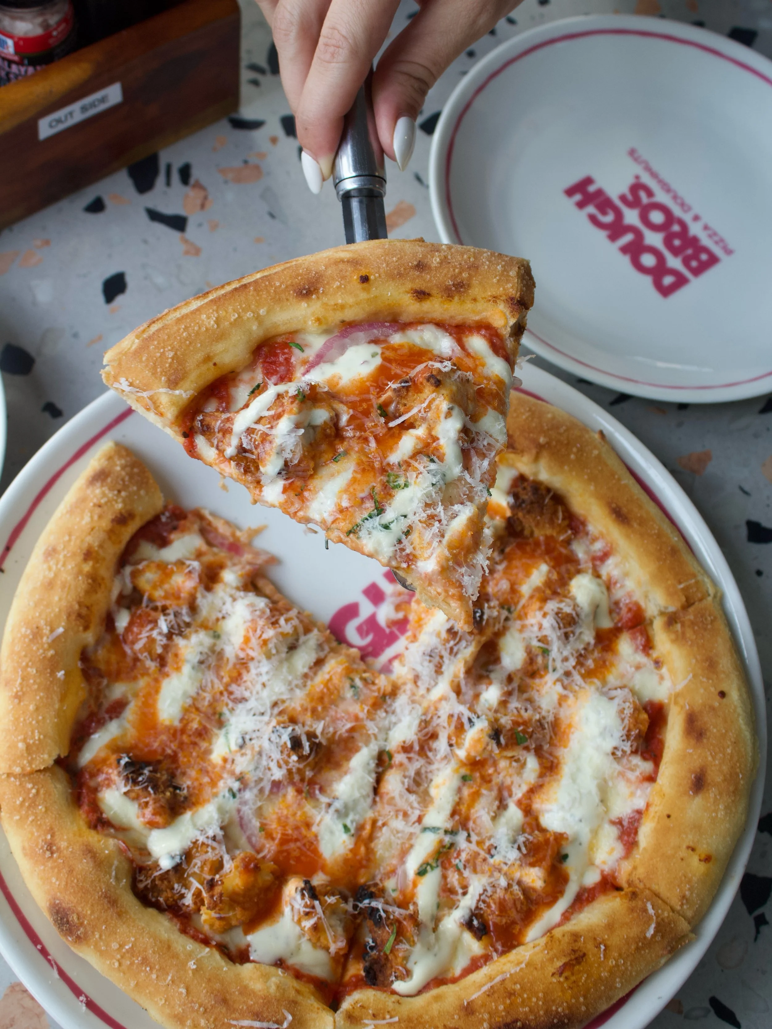 Dough Bros Fried Chicken Series just dropped 👀🔥

Tried the new Buffalo Chicken Pizza at Dough Bros - crispy chicken coated in the perfect level of buffalo sauce, paired with ranch dressing for that creamy balance 🌶️🔥

The parmesan shavings added 