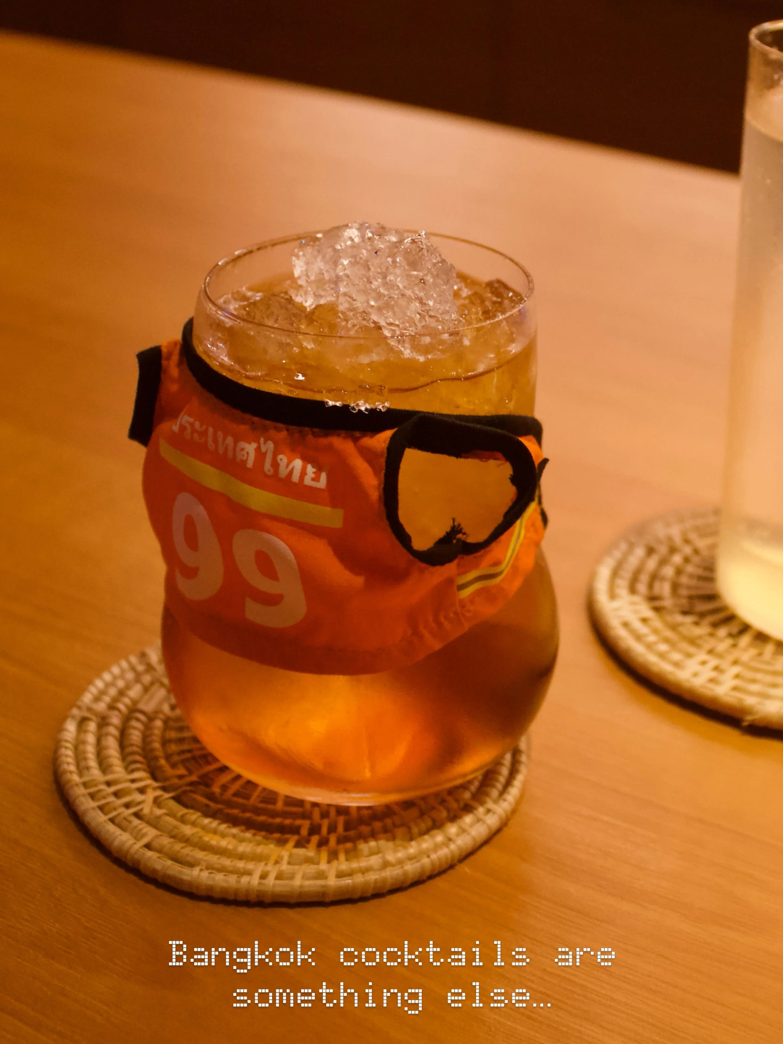 When your &ldquo;win&rdquo; cocktail comes with its own little jacket&hellip; and the Pad Kra Pao cocktail comes with a kai dao 🍳

Only in Bangkok.
📍 Lost in Thaislation

#bangkok #bangkokbars #bangkokcocktails #padkrapao #bangkokfoodie