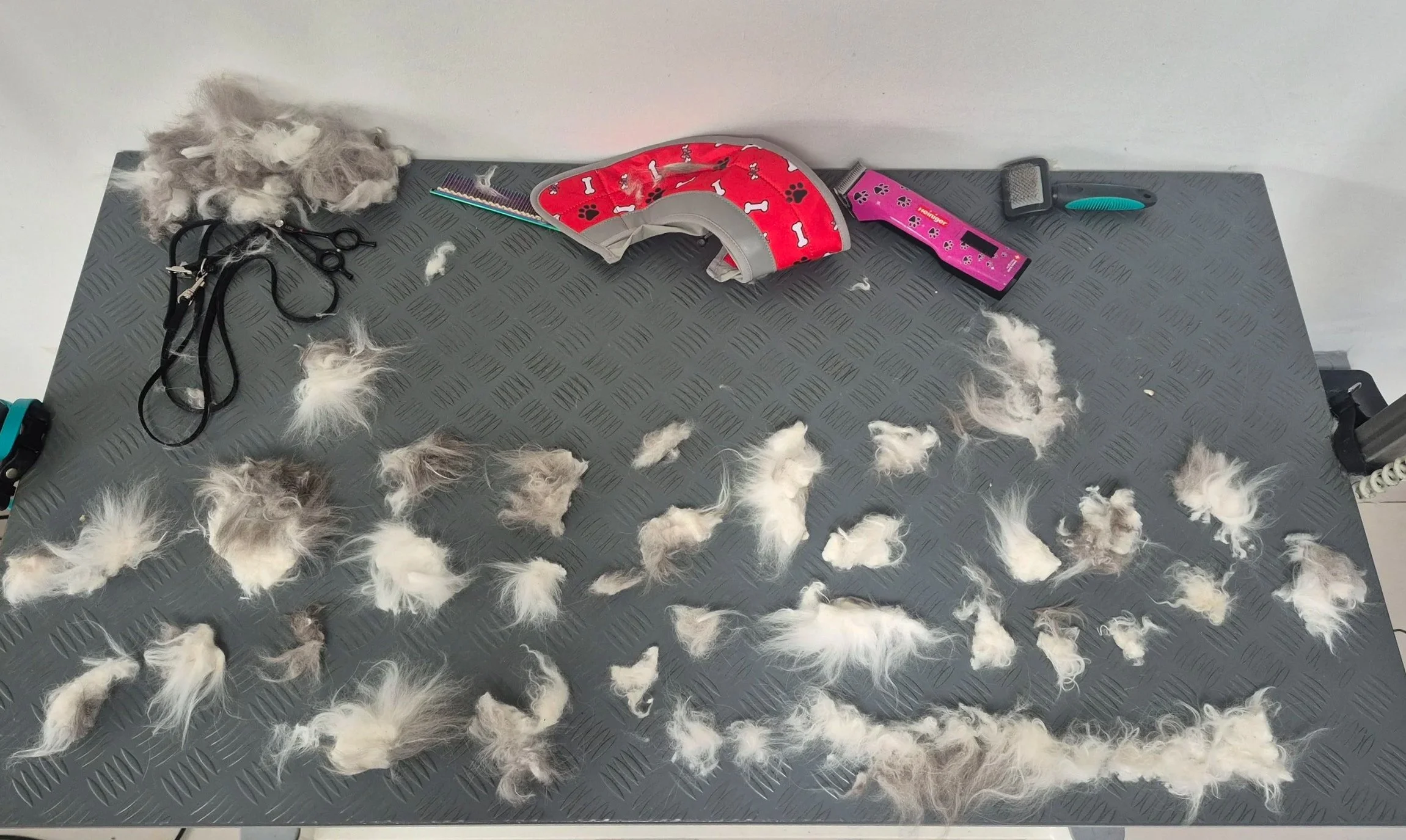 A range of matts post shave laid out on a grooming table.