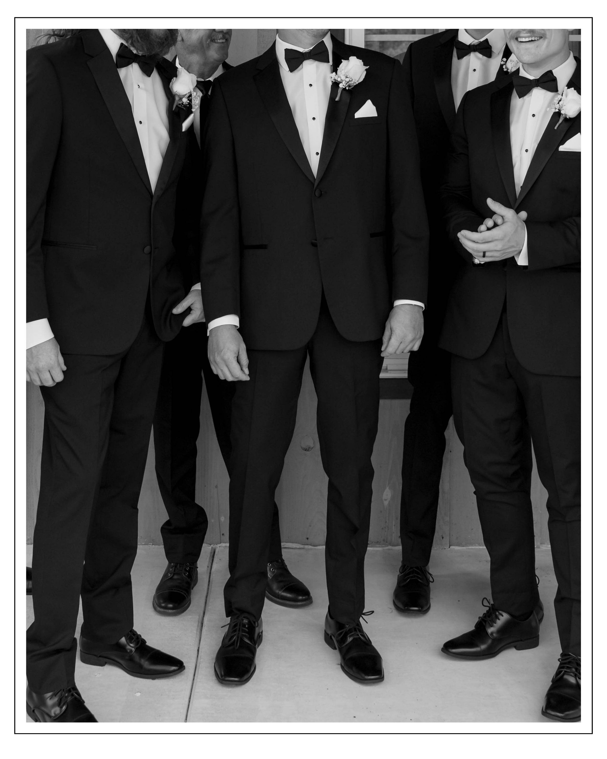 photography of groom and best men in suits