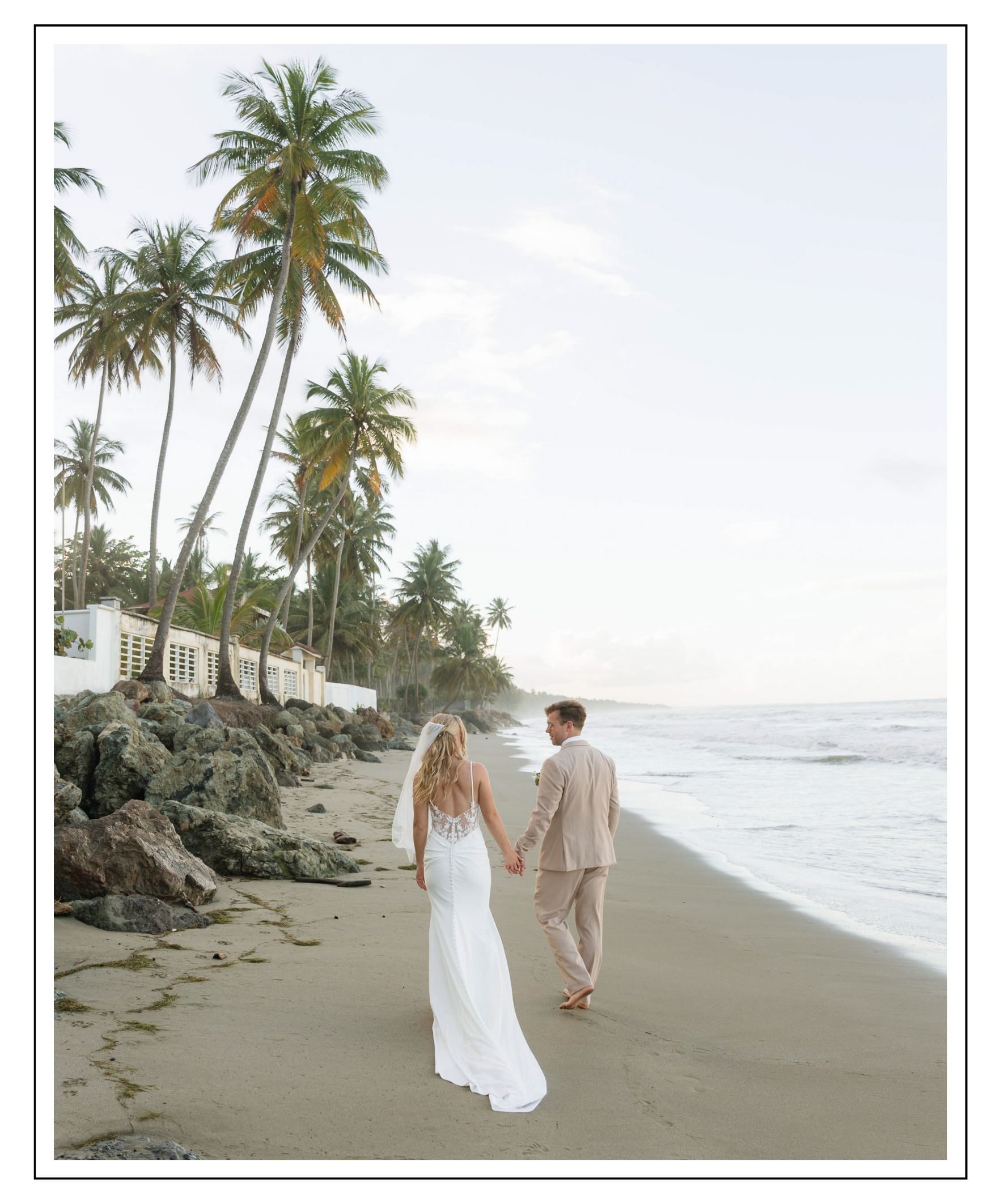 A couple walking along the beach in the Dominican Republic for their candid couple's portraits taken by Nikki Fleming Photos a destination wedding photographer.