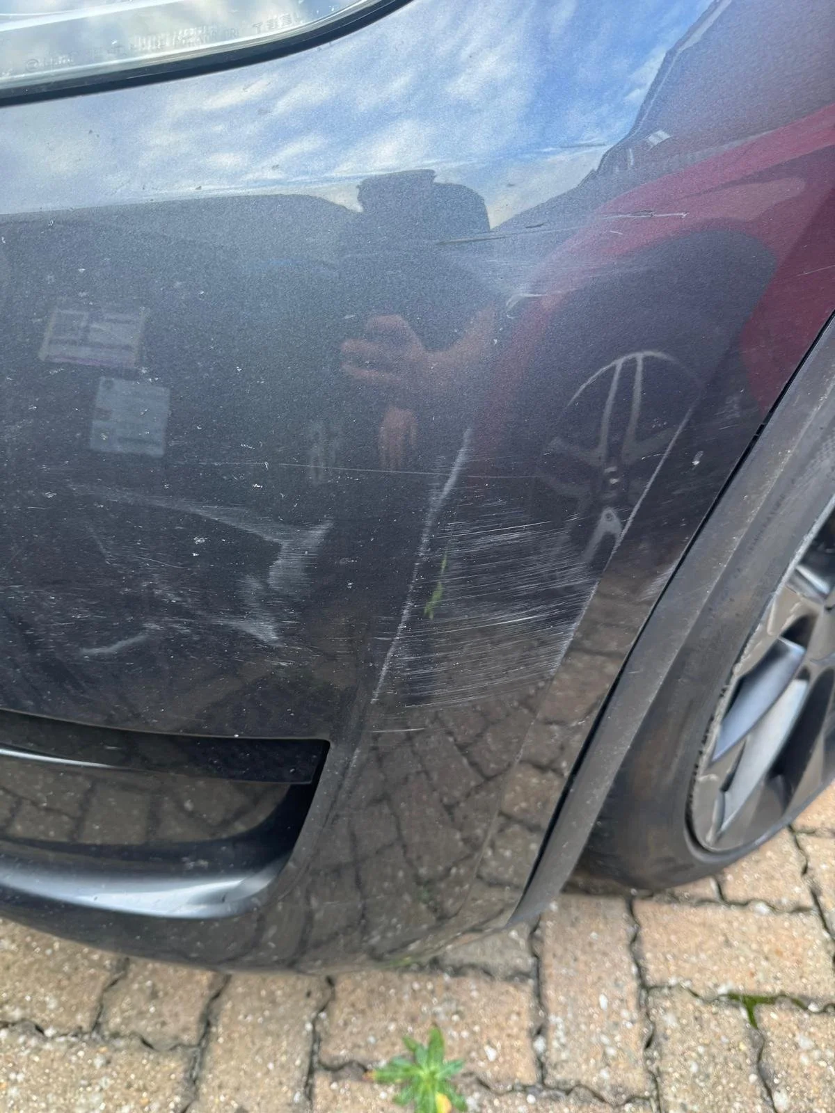 tesla bumper before repair