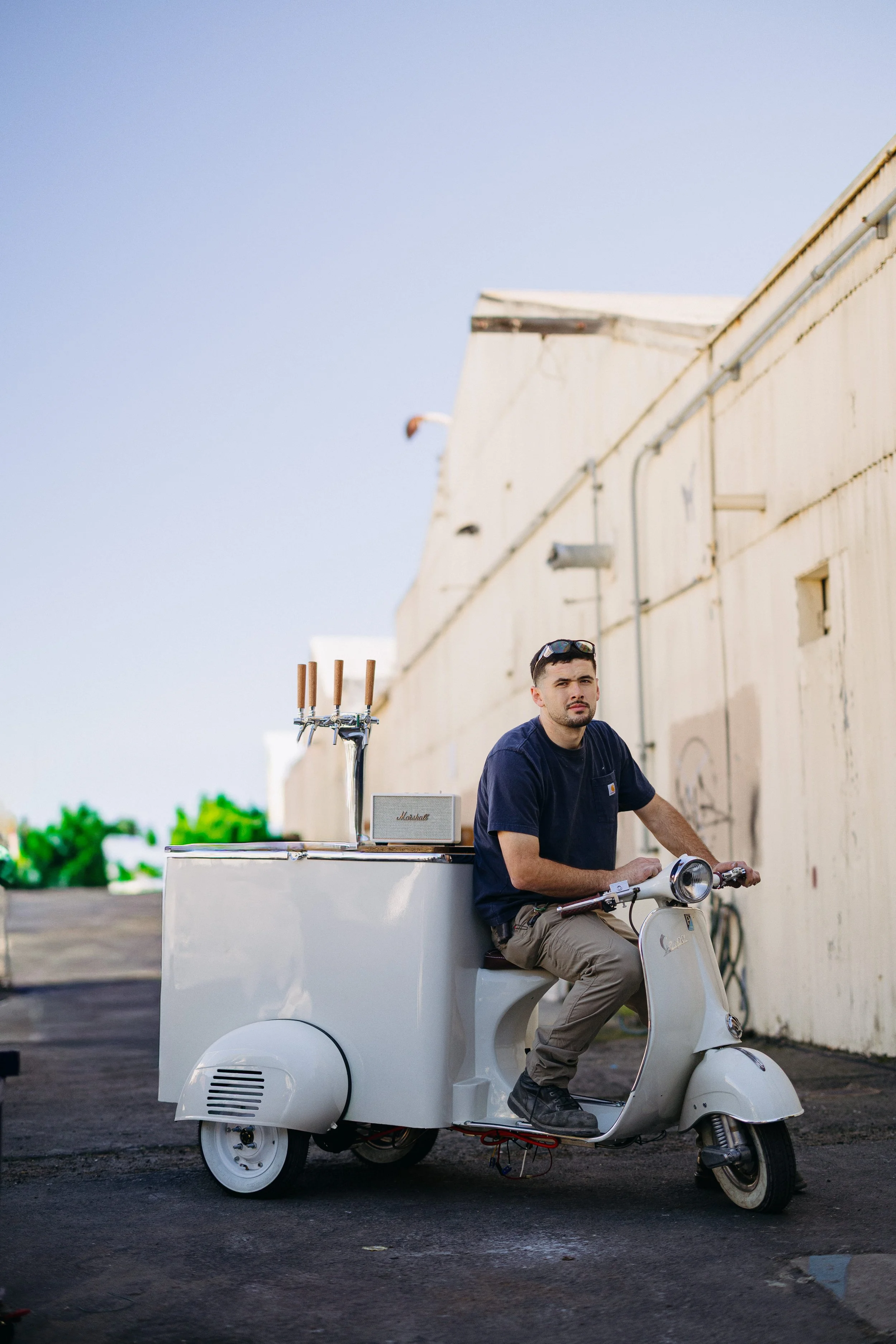Mechanic on Vespa mobile bar build