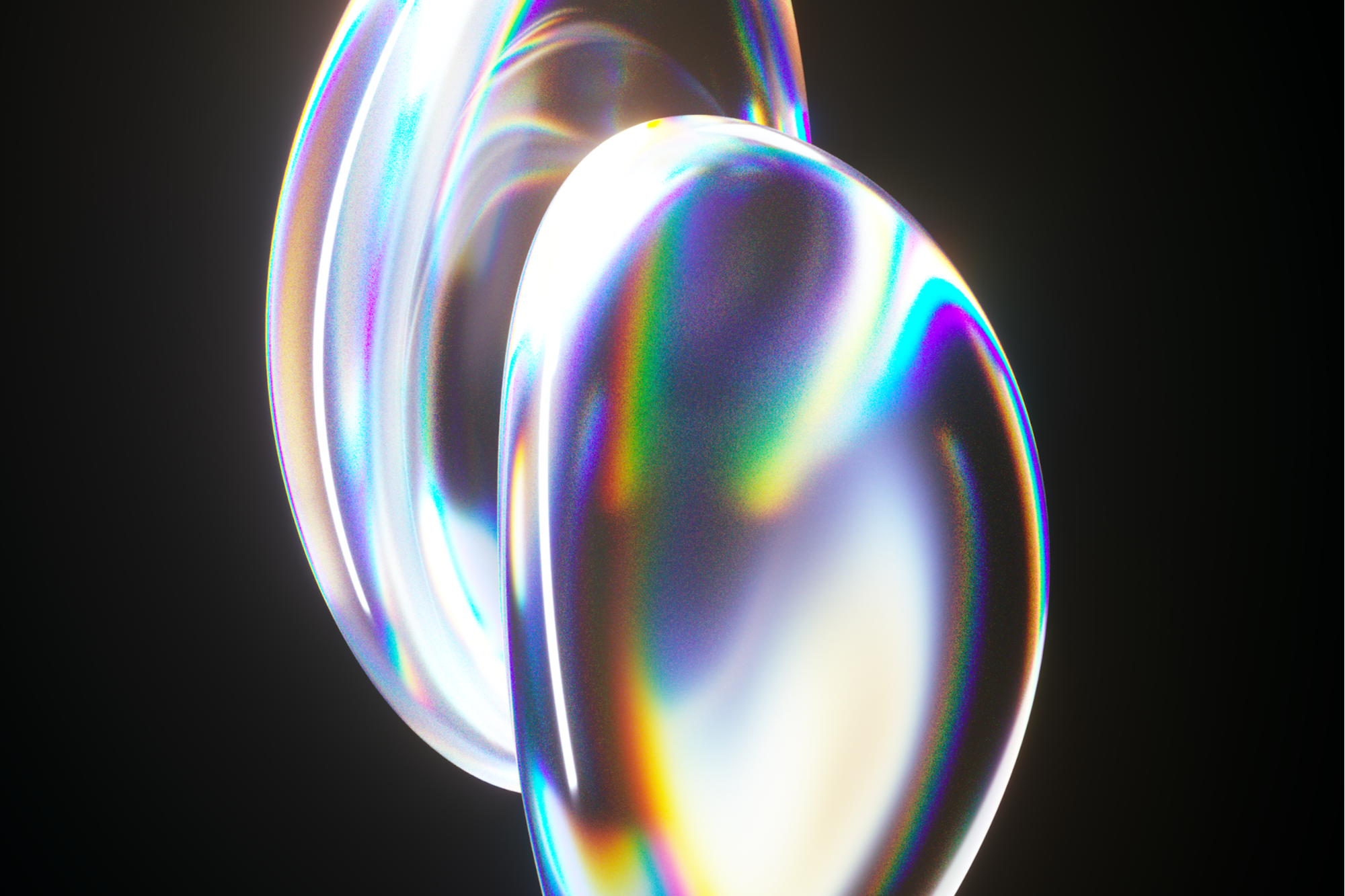 Farbige, reflektierende Glasobjekte auf schwarzem Hintergrund.