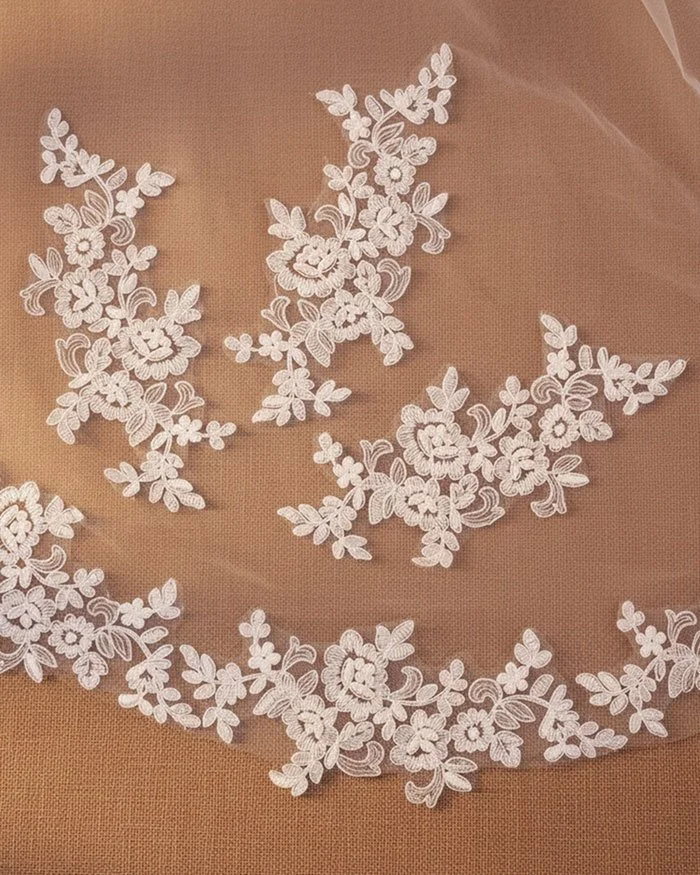 nova-scalloped-edge-lace-applique-single-tier-bridal-cathedral-length-wedding-veil-under-$100-closeup-detail-MadeWhite.jpg