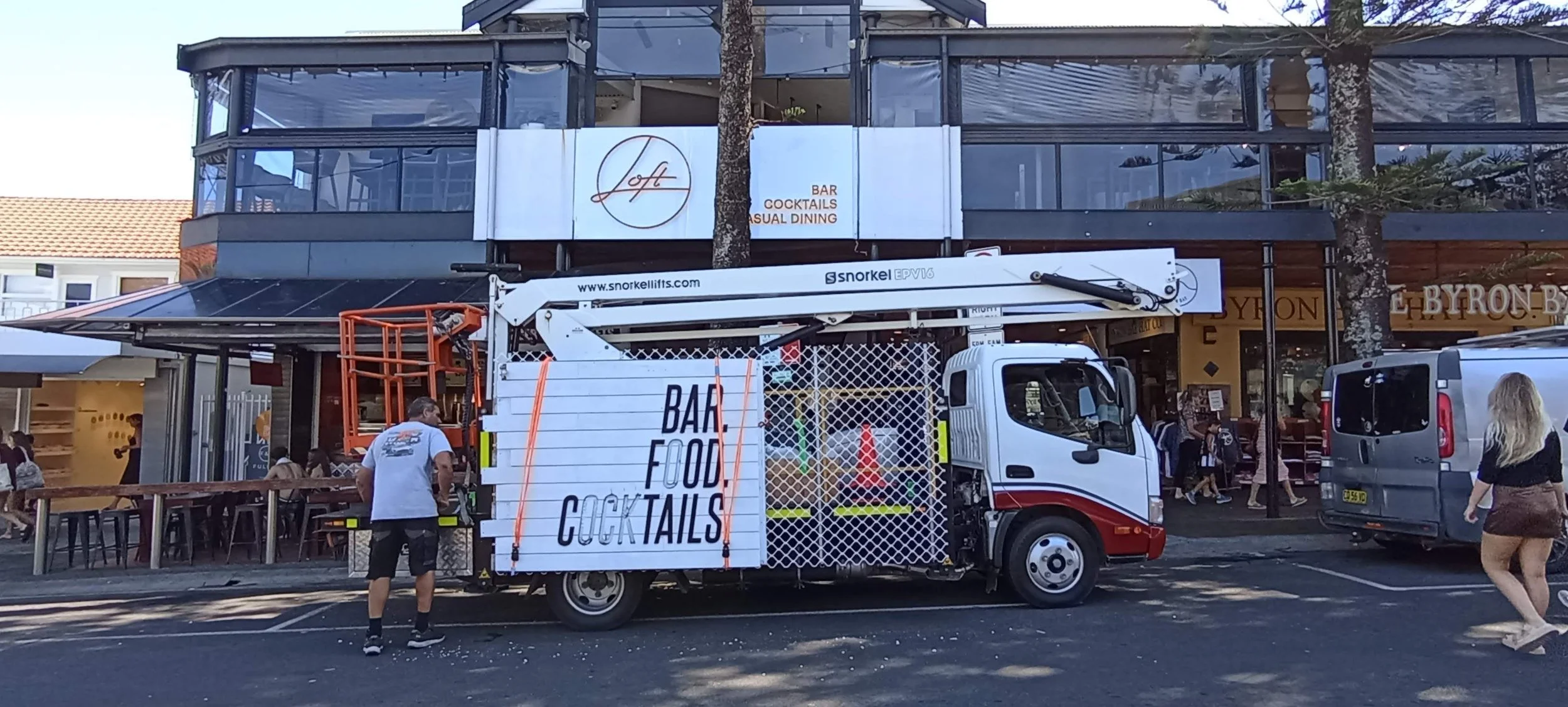 Cherry picker EWP hire in Byron Bay at Loft Bar for professional sign installation, removal and building maintenance