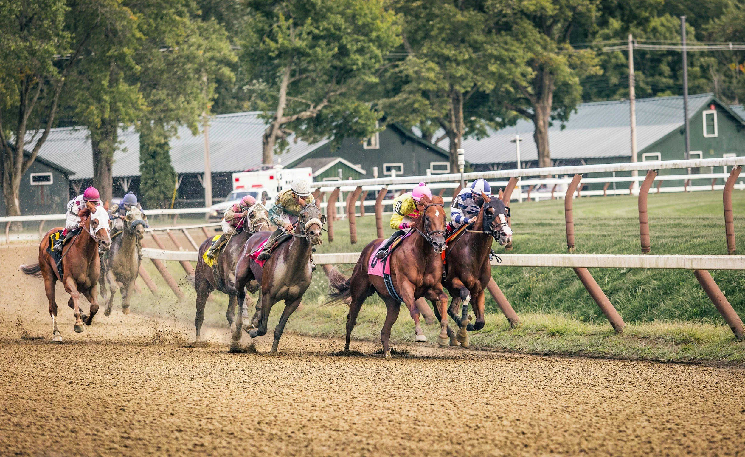 Saratoga 2026 thoroughbreds racing down the Saratoga stretch