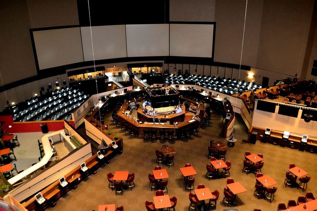 Visitors placing final bets inside Sports Haven during its closing weeks in New Haven.