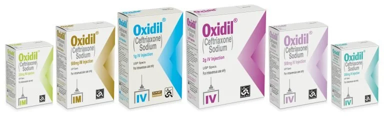 A collection of Oxidil medication boxes for different strengths, including IM, IV, and IV Injection, arranged in a row.