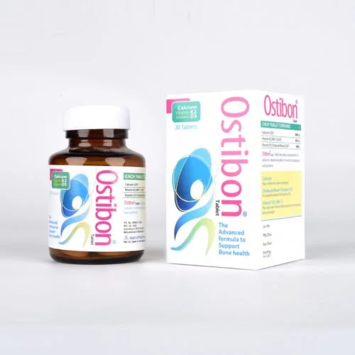 A bottle of Ostibon supplement pills next to its box packaging, which is white with colorful branding and text.