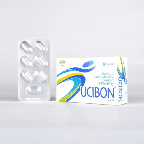 A box of UCIBON capsules and a blister pack of six capsules against a light background.