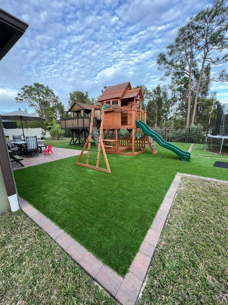 Melbourne and Palm Bay outdoor living contractor providing paver patios, pool decks, driveways, walkways, outdoor kitchens, fire pits, retaining walls, drainage solutions, concrete installation, decorative rock, and artificial turf.