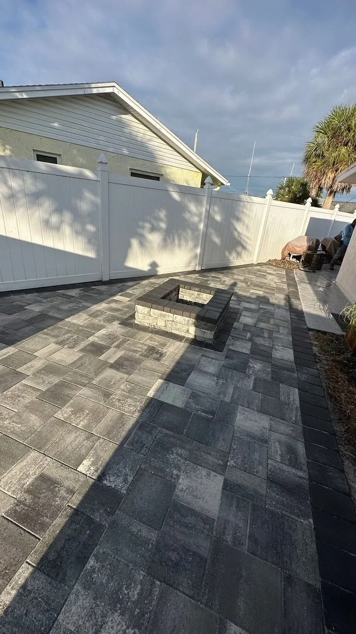 Professional paver installation contractor specializing in driveways, patios, walkways, retaining walls, outdoor kitchens, and fire pits throughout Brevard County, Florida.