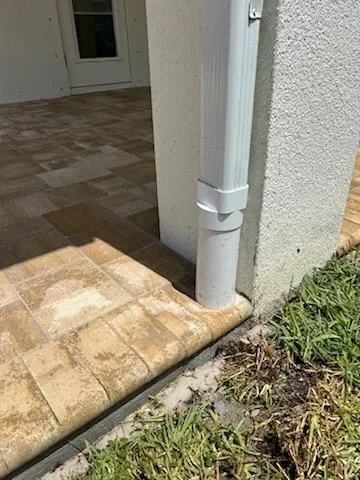 Outdoor living contractor serving Brevard County with paver driveways, patios, pool decks, retaining walls, artificial turf, concrete and drainage services.
