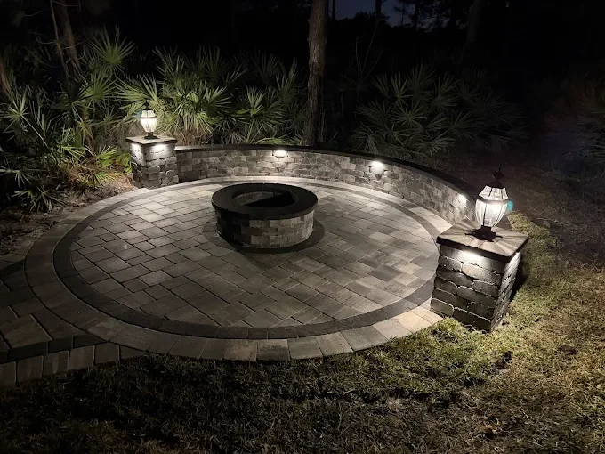 Hardscape contractor serving Brevard County with custom paver driveways, pool decks, patios, walkways, retaining walls, seating walls, outdoor kitchens, fire pits, drainage systems, concrete work, and landscape enhancements.