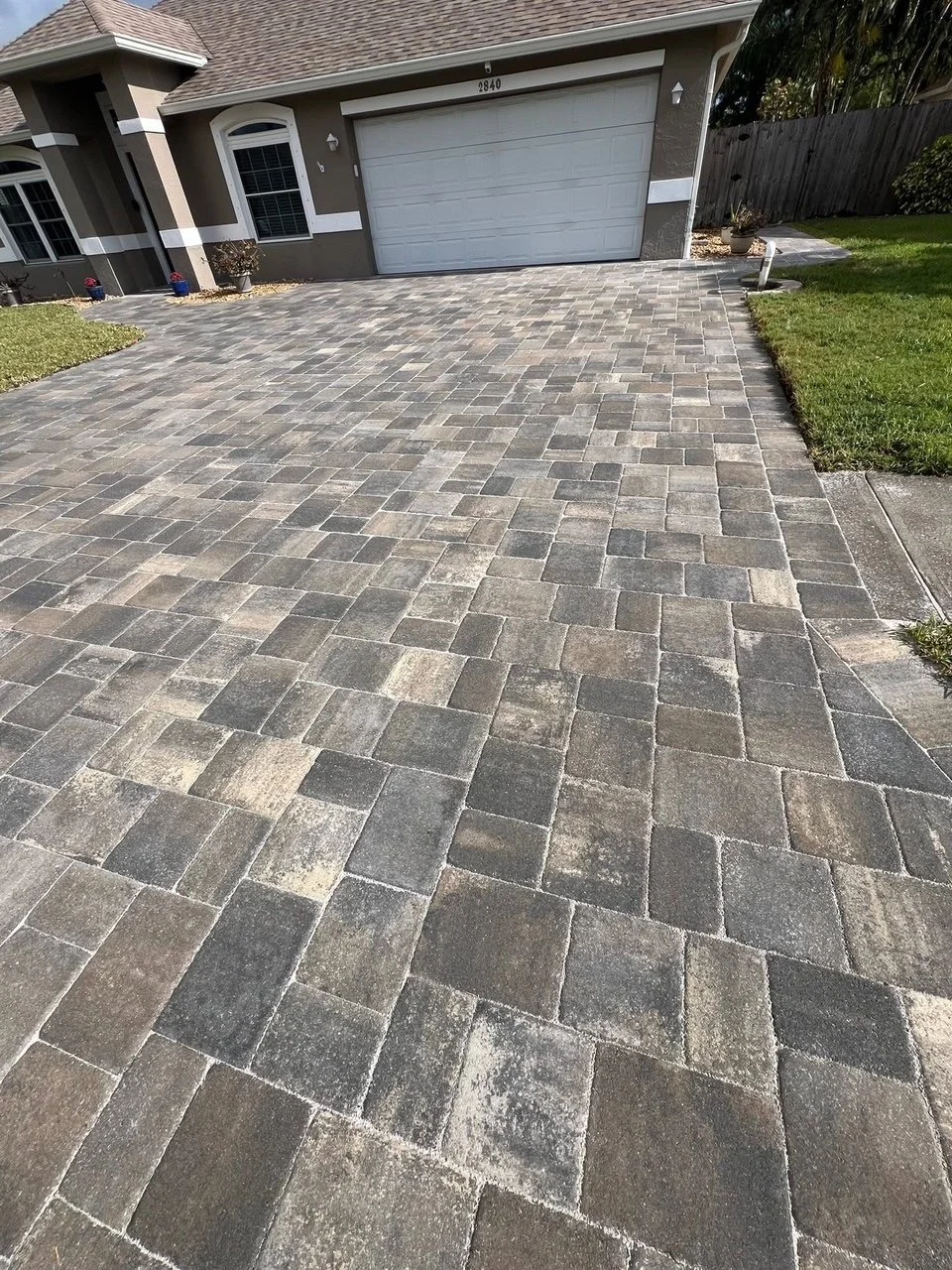 Custom paver driveway, patio, pool deck, and outdoor living installation completed by Imperium Pavers serving Melbourne, Palm Bay, Viera, Rockledge, Merritt Island, and Brevard County, Florida.