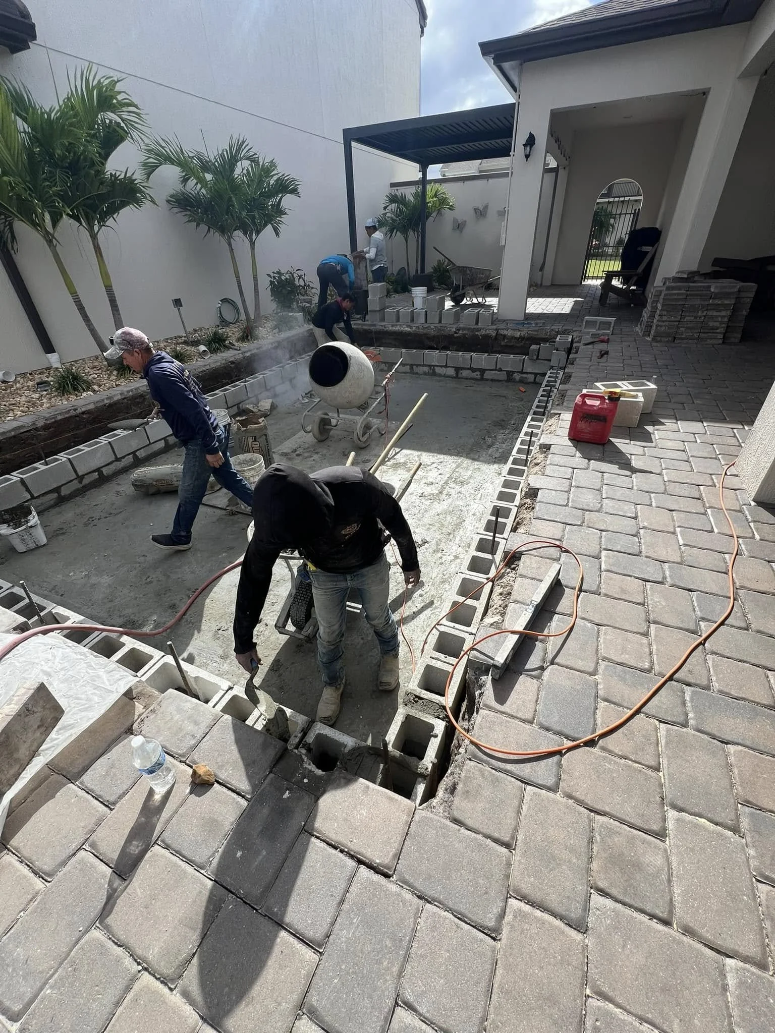 Professional paver, concrete, drainage, outdoor kitchen, fire pit, retaining wall, decorative rock, and landscape construction services provided throughout Melbourne, Palm Bay, Viera, Rockledge, Merritt Island, and surrounding Brevard County communit