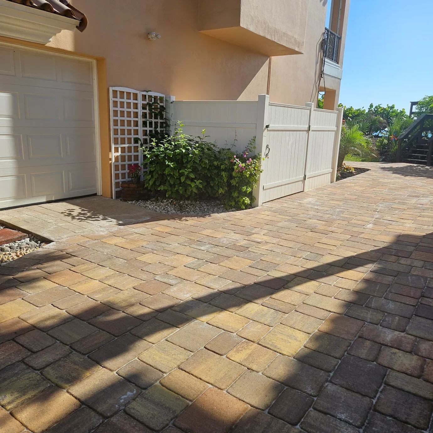 Paver installation, pool decks, patios, driveways, retaining walls, outdoor kitchens, turf and concrete for homeowners across Brevard County.
