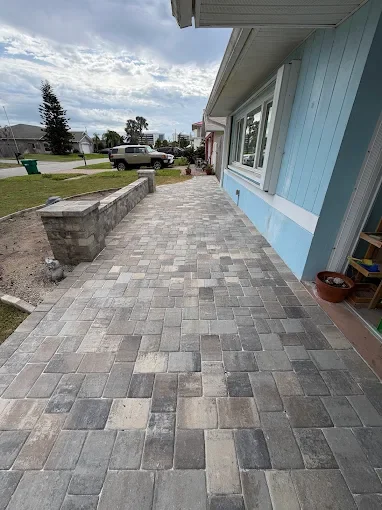 Residential hardscape contractor providing paver driveways, pool decks, patios, drainage solutions, and retaining wall installation throughout Melbourne, Viera, and Rockledge, Florida.