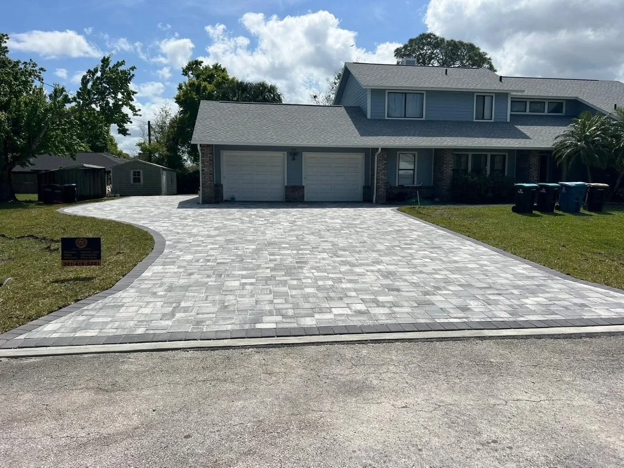 Hardscape contractor serving Brevard County with custom paver driveways, pool decks, patios, walkways, retaining walls, seating walls, outdoor kitchens, fire pits, drainage systems, concrete work, and landscape enhancements.