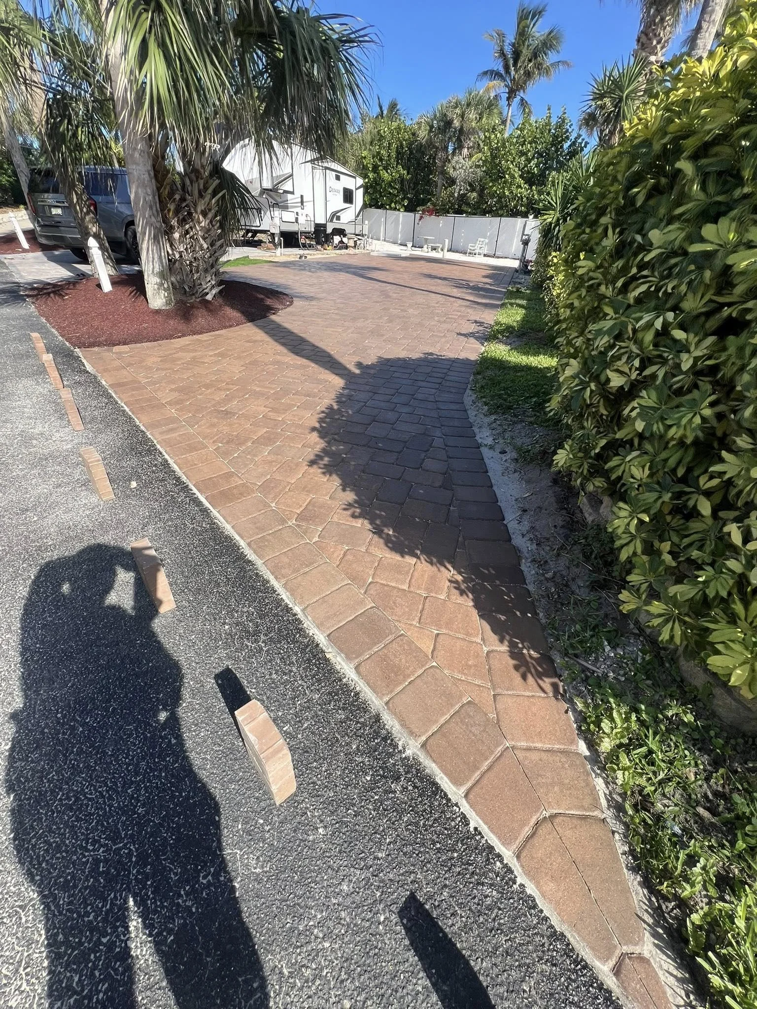 Brevard County paver contractor specializing in paver driveways, patios, pool decks, walkways, retaining walls, outdoor kitchens, fire pits, concrete driveways, concrete patios, drainage correction, decorative rock installation, artificial turf
