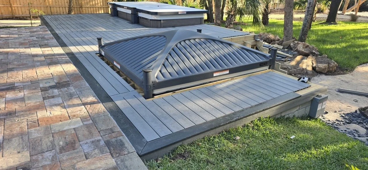 Hardscape contractor serving Brevard County with custom paver driveways, pool decks, patios, walkways, retaining walls, seating walls, outdoor kitchens, fire pits, drainage systems, concrete work, and landscape enhancements.