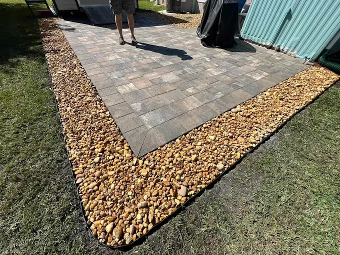 Custom outdoor living, paver installation, paver driveways, patios, pool decks, walkways, retaining walls, seating walls, outdoor kitchens, fire pits, concrete driveways, concrete patios, concrete walkways, drainage solutions, culvert installation