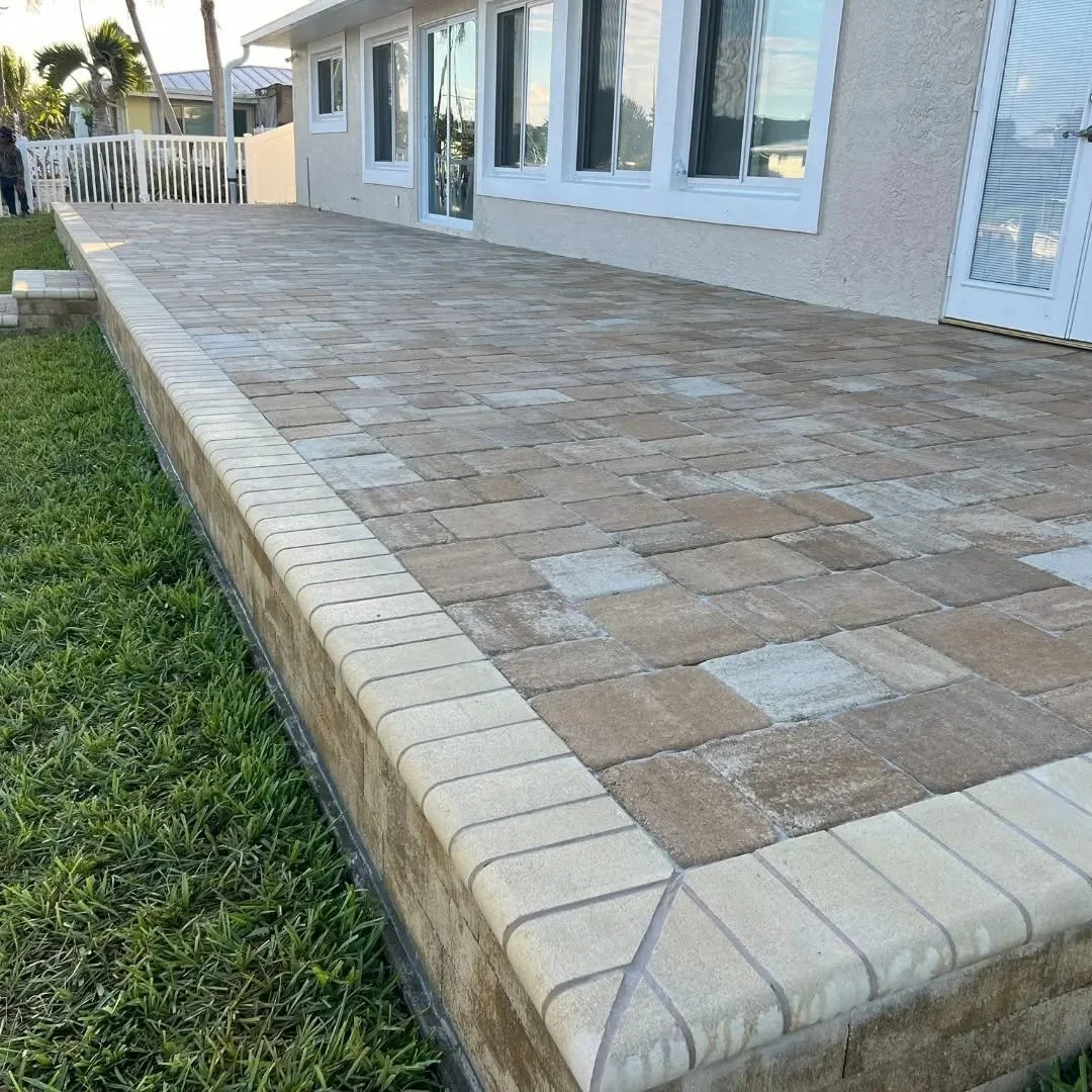 Custom outdoor living, paver installation, paver driveways, patios, pool decks, walkways, retaining walls, seating walls, outdoor kitchens, fire pits, concrete driveways, concrete patios, concrete walkways, drainage solutions, culvert installation