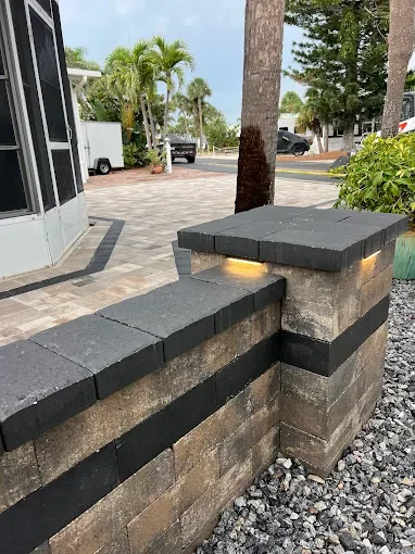 Outdoor living contractor specializing in paver patios, pool decks, outdoor kitchens, fire pits, and retaining walls serving Melbourne, Palm Bay, and surrounding Florida communities.