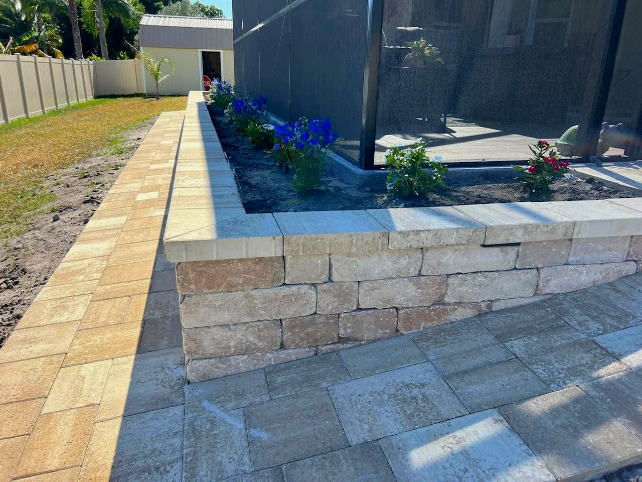 Custom paver installation, outdoor living, concrete, drainage, retaining wall, artificial turf, and landscape projects completed by Imperium Pavers throughout Melbourne, Palm Bay, Viera, Suntree, Rockledge, Merritt Island, Satellite Beach, Melbourne 