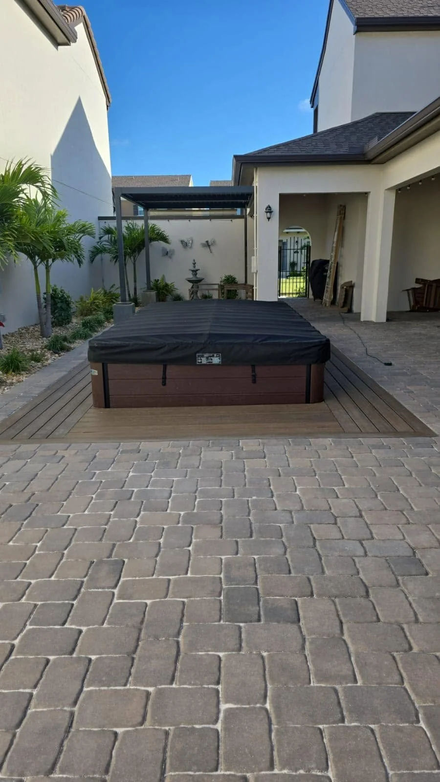Custom outdoor living, paver installation, paver driveways, patios, pool decks, walkways, retaining walls, seating walls, outdoor kitchens, fire pits, concrete driveways, concrete patios, concrete walkways, drainage solutions, culvert installation