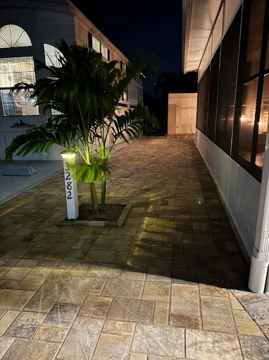 Hardscape contractor serving Brevard County with custom paver driveways, pool decks, patios, walkways, retaining walls, seating walls, outdoor kitchens, fire pits, drainage systems, concrete work, and landscape enhancements.