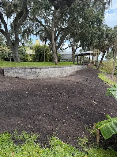 Outdoor living contractor serving Brevard County with paver driveways, patios, pool decks, retaining walls, artificial turf, concrete and drainage services.