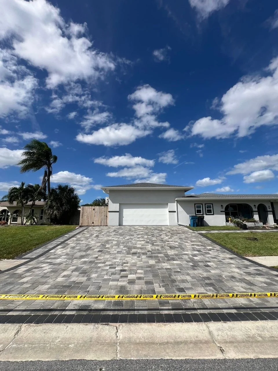 Custom paver driveway installation completed in Melbourne, Florida, featuring durable interlocking pavers designed to improve curb appeal, increase property value, and create a beautiful, long-lasting entrance for the homeowner.