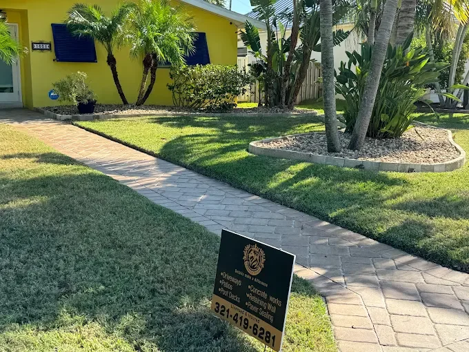 Outdoor living contractor specializing in paver patios, pool decks, outdoor kitchens, fire pits, and retaining walls serving Melbourne, Palm Bay, and surrounding Florida communities.