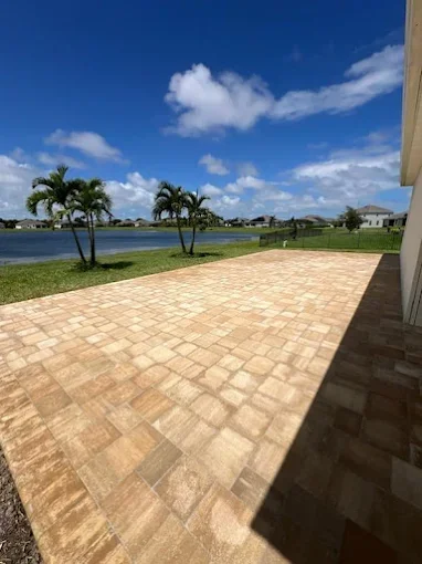 Hardscape contractor serving Brevard County with custom paver driveways, pool decks, patios, walkways, retaining walls, seating walls, outdoor kitchens, fire pits, drainage systems, concrete work, and landscape enhancements.