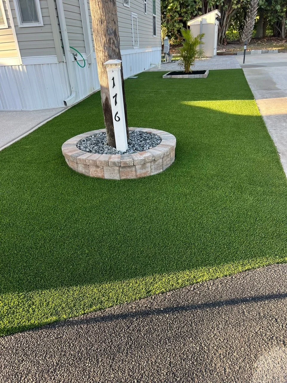 Hardscape contractor serving Brevard County with custom paver driveways, pool decks, patios, walkways, retaining walls, seating walls, outdoor kitchens, fire pits, drainage systems, concrete work, and landscape enhancements.