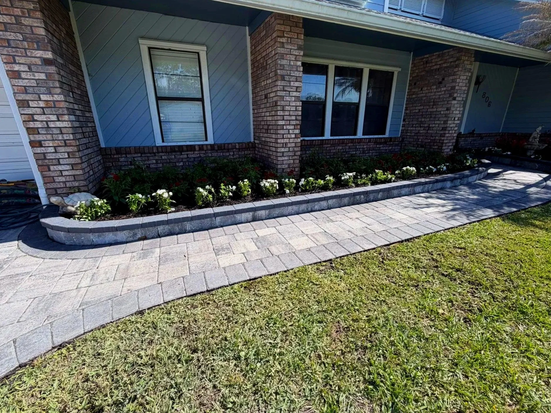 Custom paver walkway installation serving Melbourne, Palm Bay, Viera, Rockledge, Suntree, and Merritt Island, Florida, creating attractive pathways that improve accessibility, curb appeal, and the overall functionality of outdoor spaces.