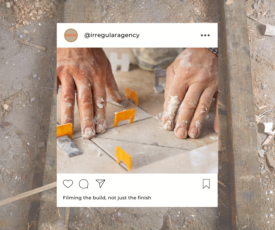 Close-up of hands installing tiles on a floor, with tile spacers in place, surrounded by construction debris.