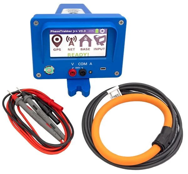 Blue electronic device with screen displaying icons for GPS, network, base, and input, connected to red and black probes, with orange and black power cables coiled nearby.