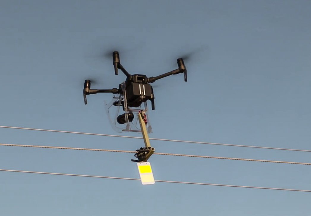 Drone inspecting power lines.