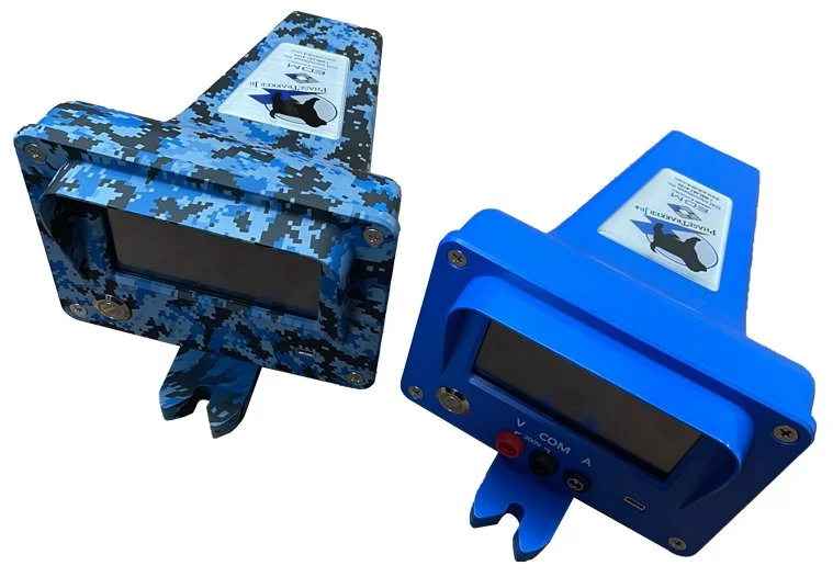 Two digital fishing bite alarms, one in blue camouflage and the other in solid blue, with LCD screens and control buttons, used for indicating fish bites.