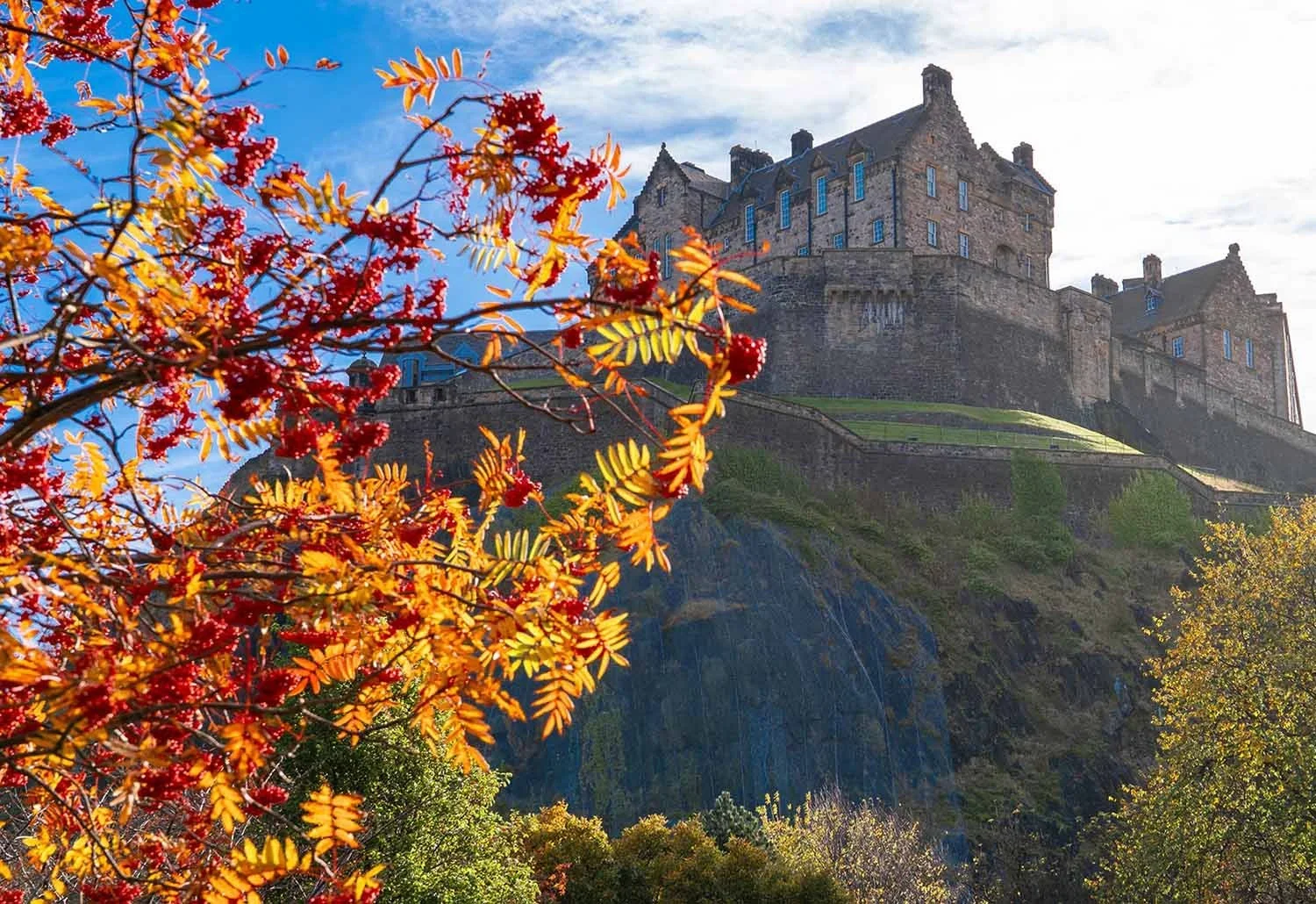 Edinburgh Castle viewed from Princes Street Gardens. Image by Shutter Scotland, provider of Edinburgh photography walks.