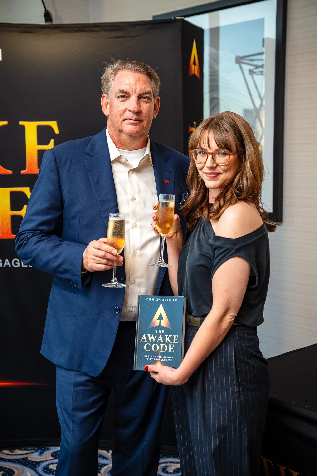 Gordon Charles MacLean with a guest at The Awake Code launch event