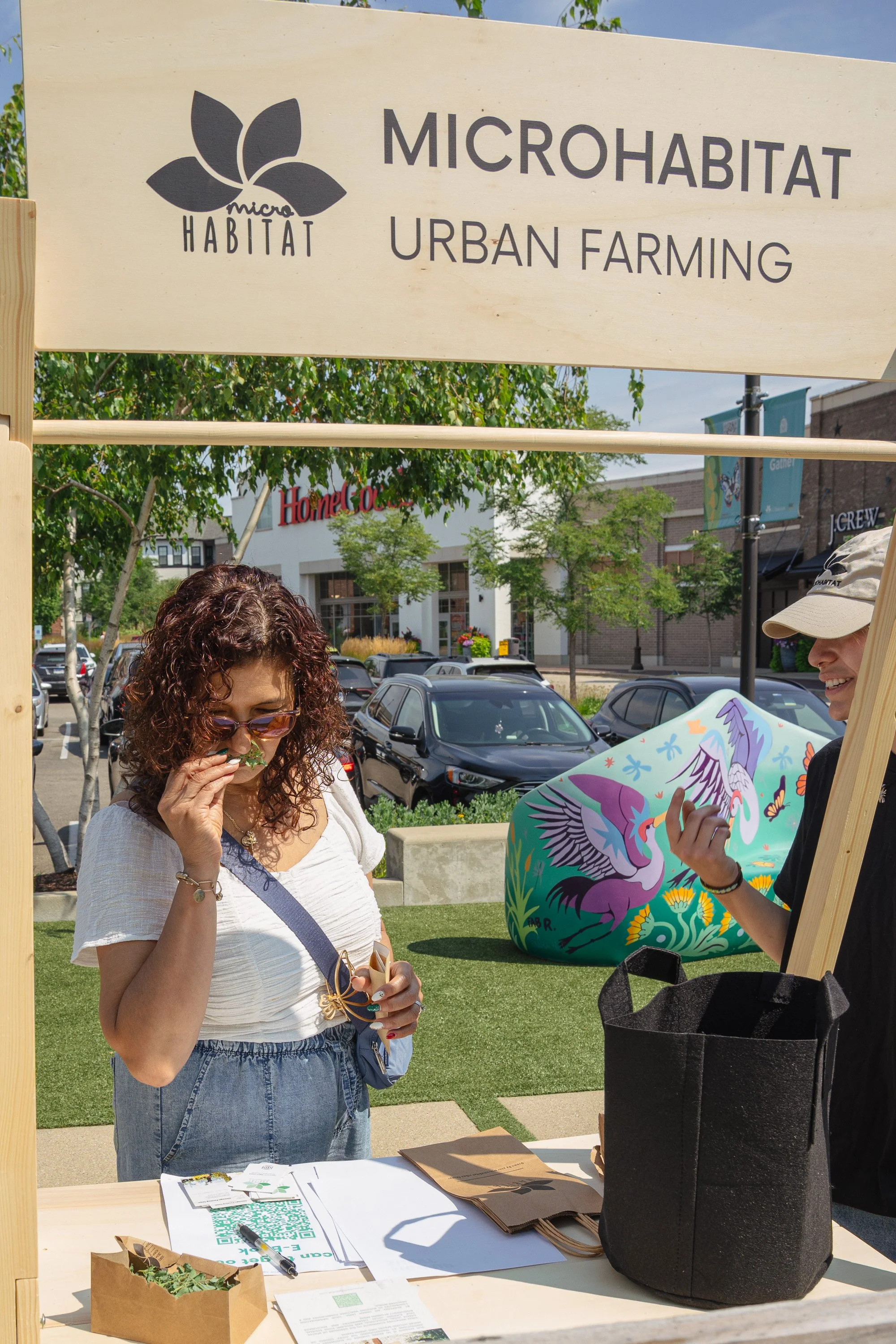 Guest participating in an Urban Farm educational event at Mellody Farm