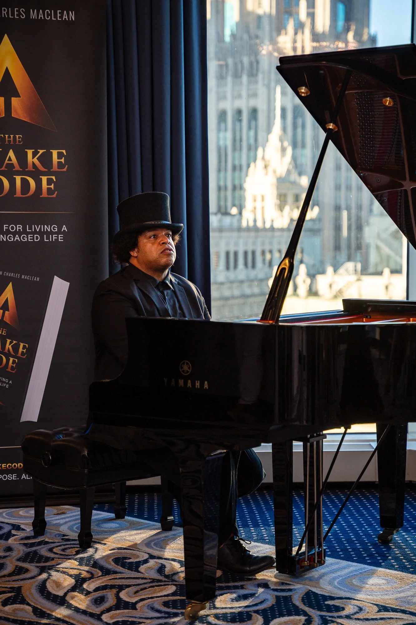 Pianist ELEW performing at The Awake Code launch event in Chicago