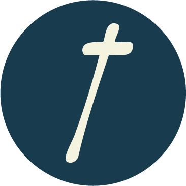 A white Christian cross on a dark blue circular background.