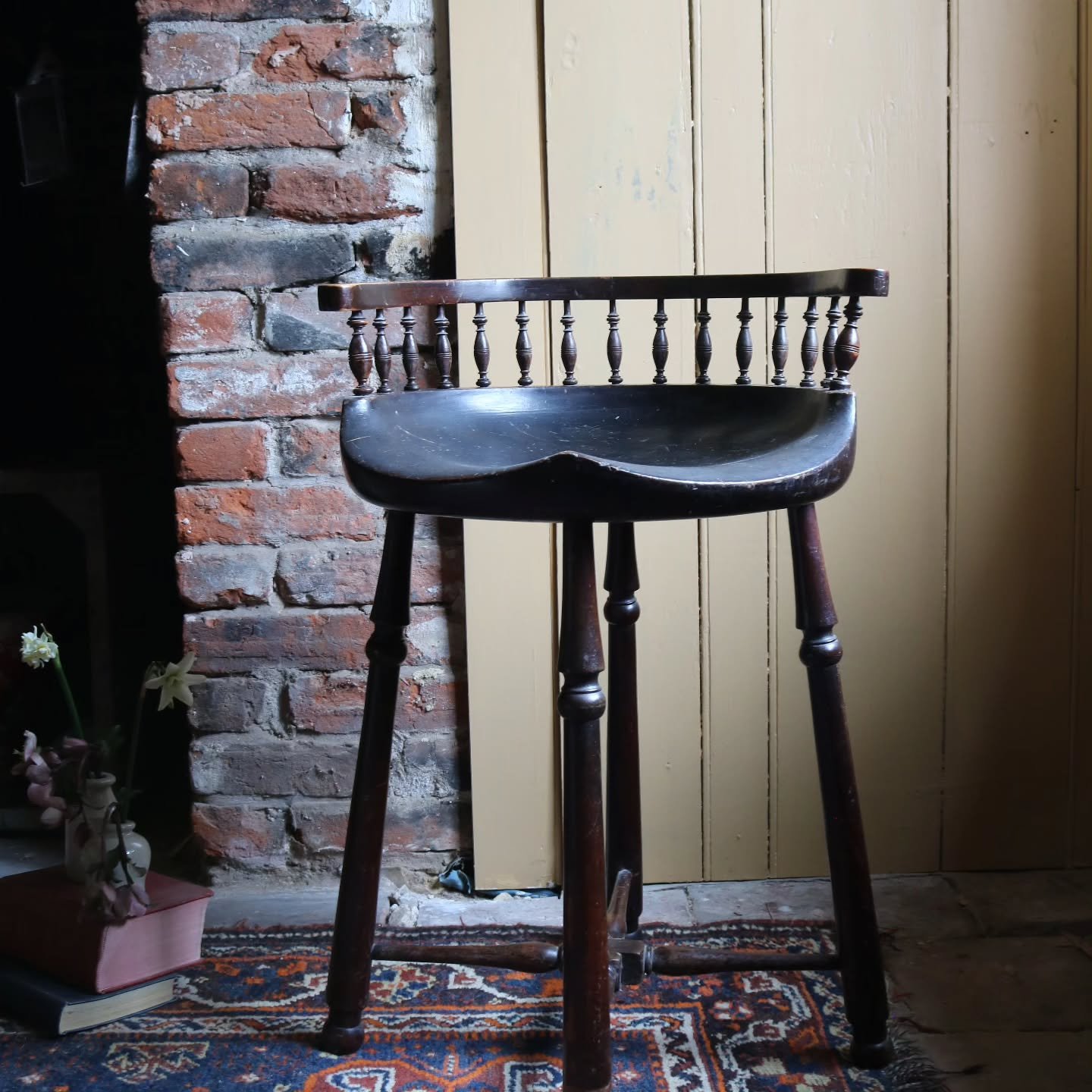 A proper country piece.

19th century English dish-seat stool with turned spindle gallery and the kind of patina only time can give. The scooped seat, the darkened timber, the quiet sturdiness - everything about it feels settled and honest.

Beautifu