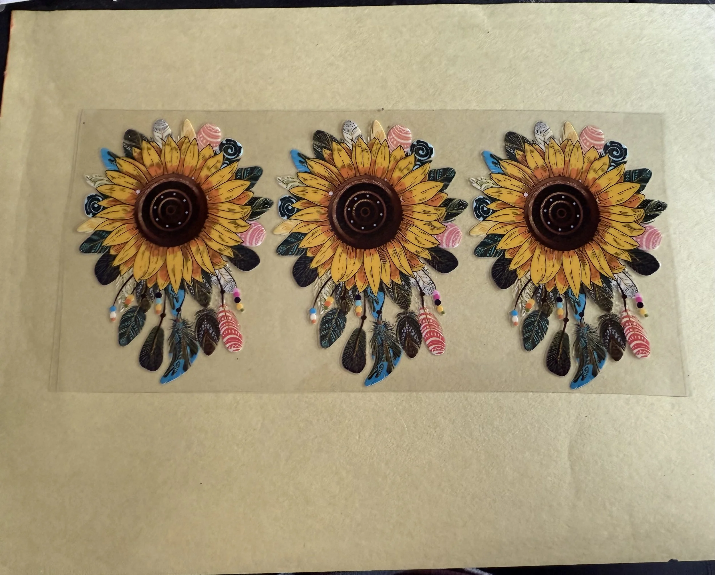 sunflower with feathers.jpeg